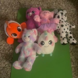 A bundle of six. Stuffy‘s. Four of them are from build a bear almost new